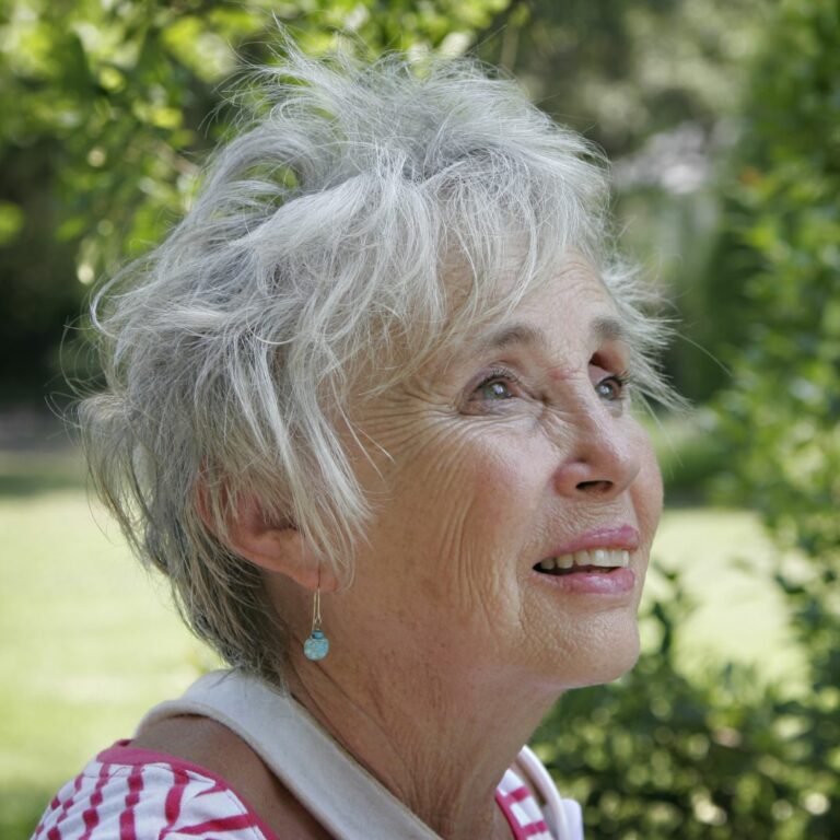 Older woman looking up