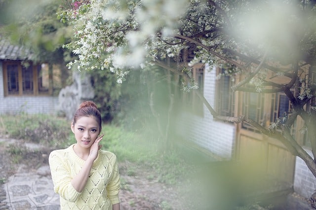 Young woman outside in garden